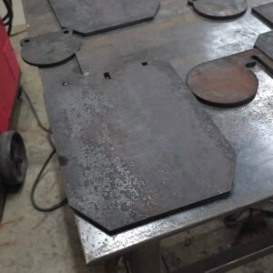 Unfinished SR500 steel targets in production at Dead Center Fabrication, cut and prepared for final finishing and customer orders